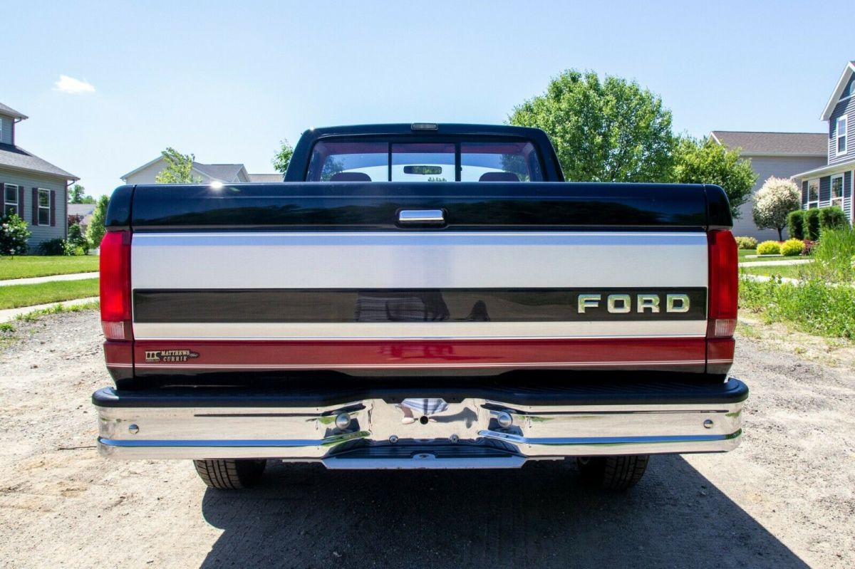 1993 Black/Red Ford F-150 Standard Cab Pickup