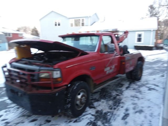 1993 red Ford Tow Truck