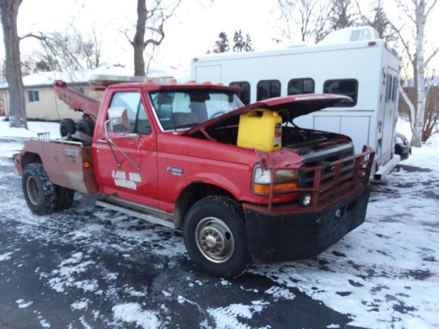 1993 red Ford Tow Truck