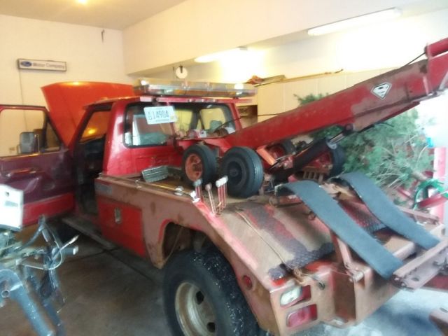 1993 red Ford Tow Truck