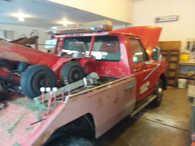 1993 red Ford Tow Truck