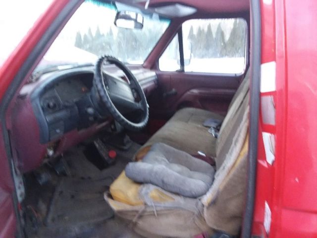 1993 red Ford Tow Truck