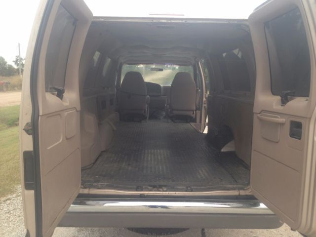 1993 Brown Ford E-Series Van Extended Passenger Van