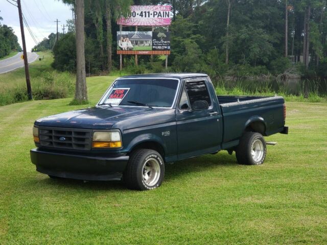 1993 Green Ford F-150 Standard Cab Pickup