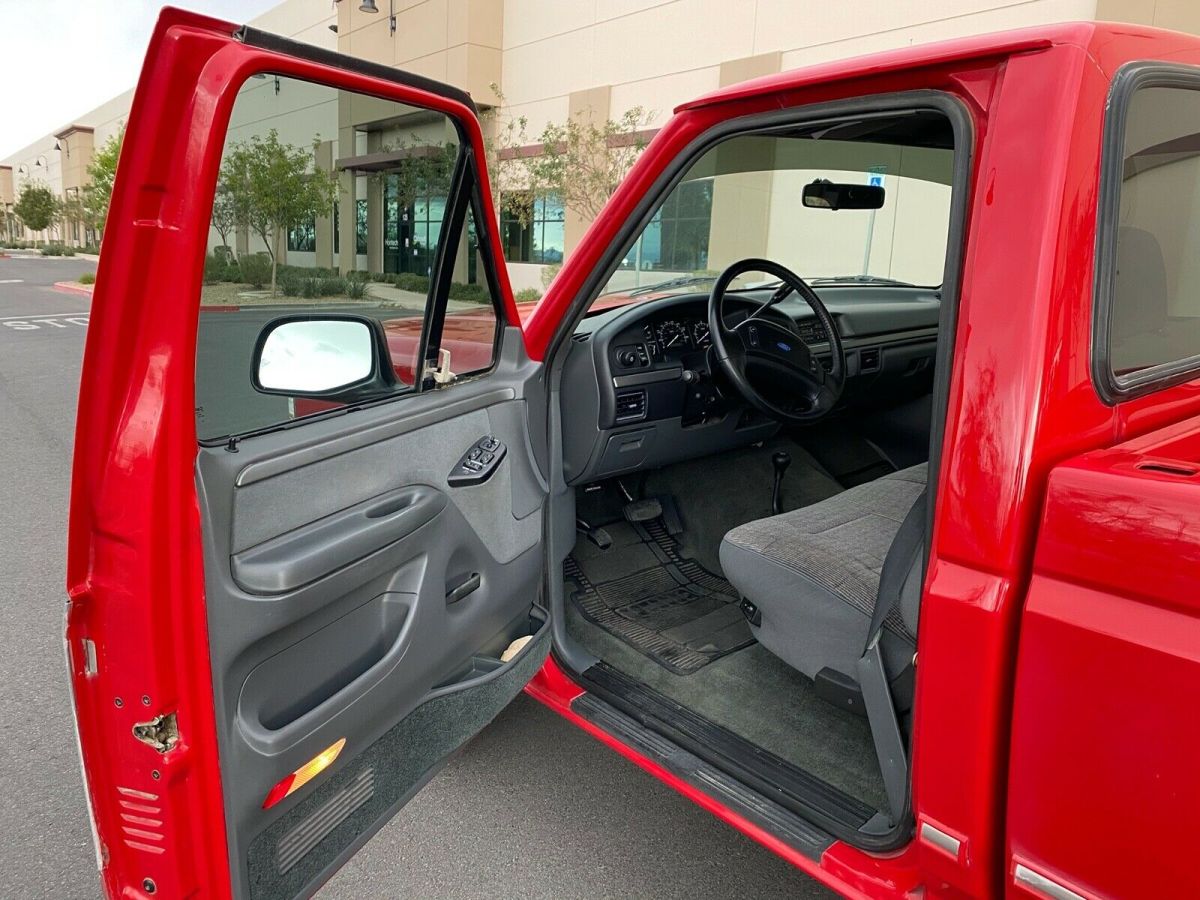 1993 Red Ford F-150 Standard Cab Pickup
