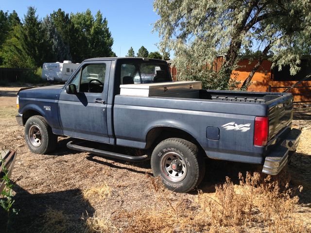 1993 Red Ford F-150 Standard Cab Pickup