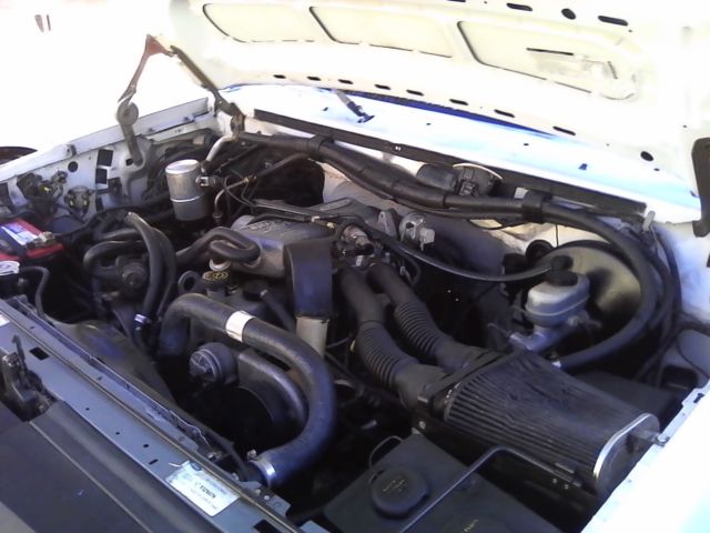 1993 White Ford F-150 Standard Cab Pickup