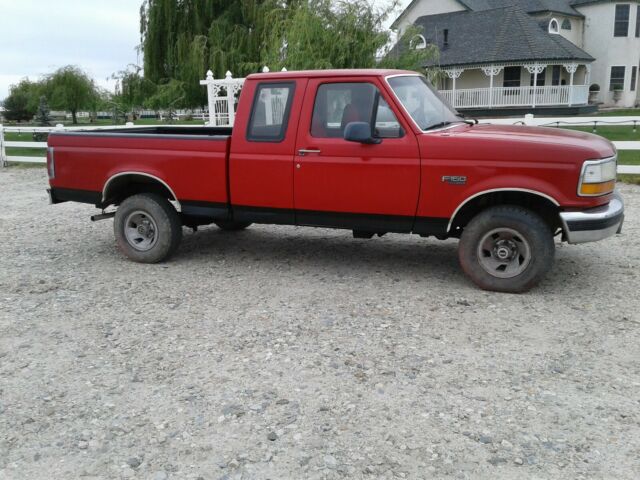 1993 RED and BLACK Ford F-150 Extended Cab Pickup