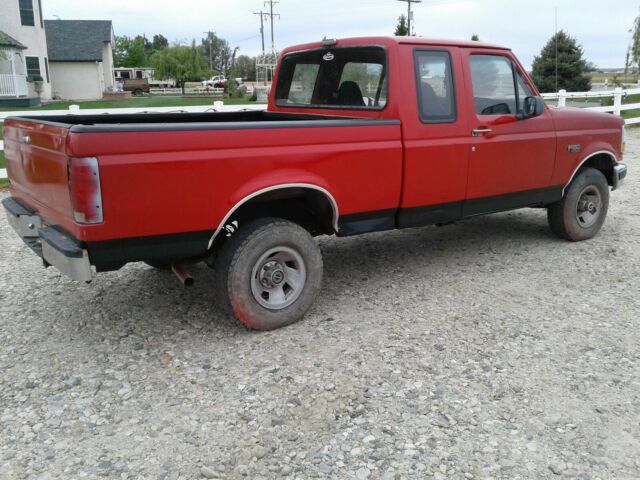 1993 RED and BLACK Ford F-150 Extended Cab Pickup