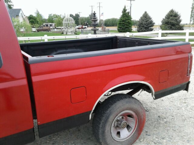 1993 RED and BLACK Ford F-150 Extended Cab Pickup