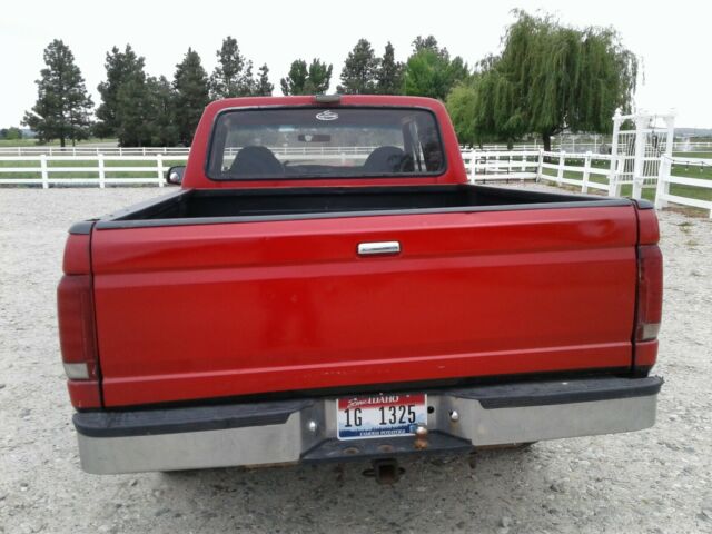 1993 RED and BLACK Ford F-150 Extended Cab Pickup