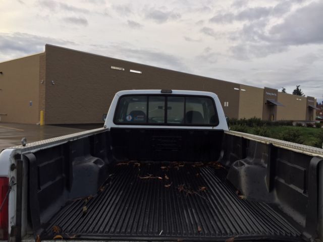 1993 white/grey Ford F-250 Extended Cab Pickup