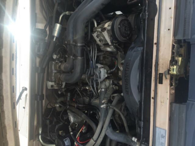 1993 Gold/Brown Ford F-250 Extended Cab Pickup