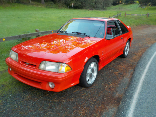 1993 red Ford Mustang