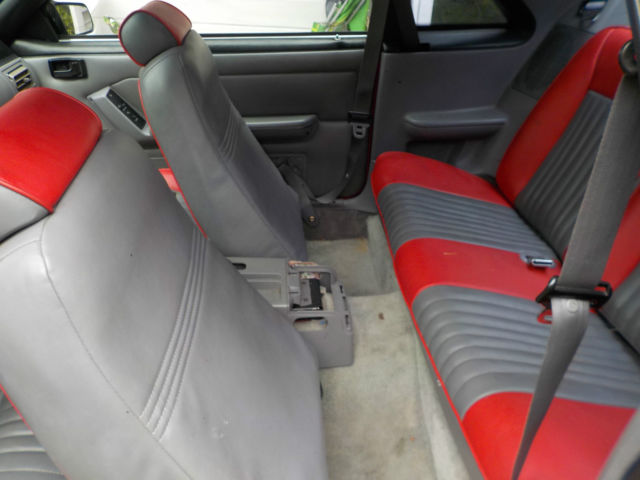 1993 red Ford Mustang