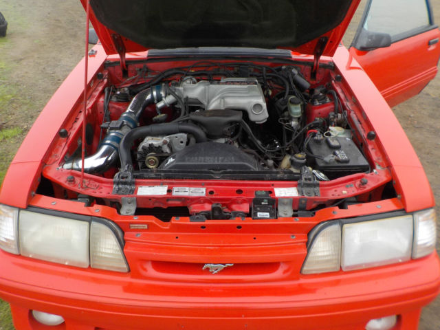 1993 red Ford Mustang