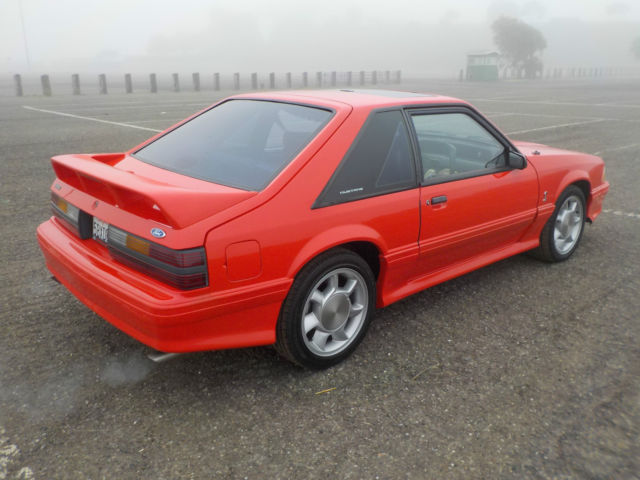 1993 red Ford Mustang