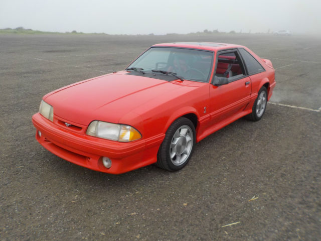 1993 red Ford Mustang