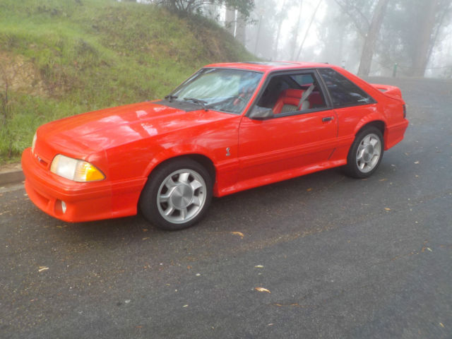 1993 red Ford Mustang