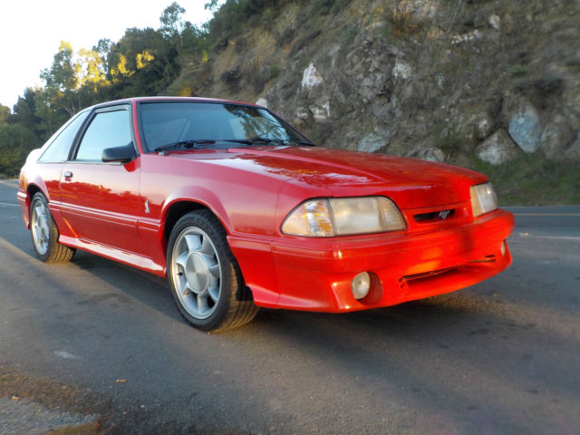 1993 red Ford Mustang