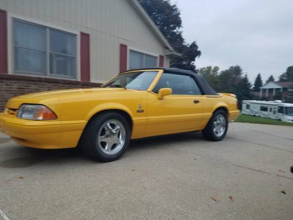 1993 yellow Ford Mustang Convertible