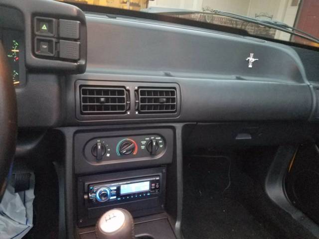 1993 yellow Ford Mustang Convertible