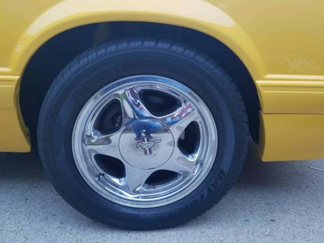1993 yellow Ford Mustang Convertible