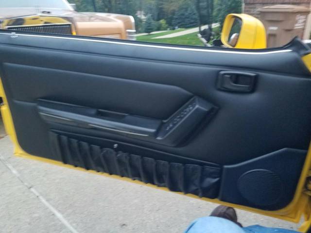 1993 yellow Ford Mustang Convertible