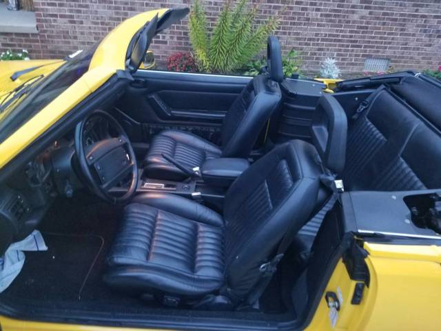 1993 yellow Ford Mustang Convertible