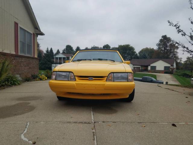 1993 yellow Ford Mustang Convertible