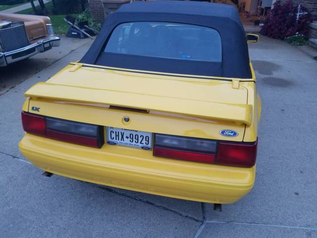 1993 yellow Ford Mustang Convertible
