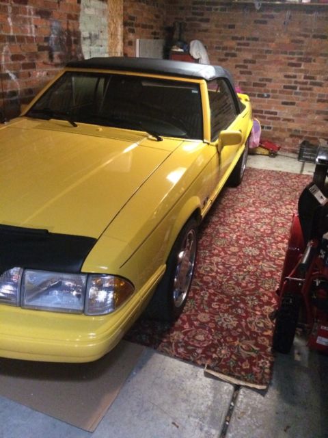 1993 Canary yellow Ford Mustang Convertible