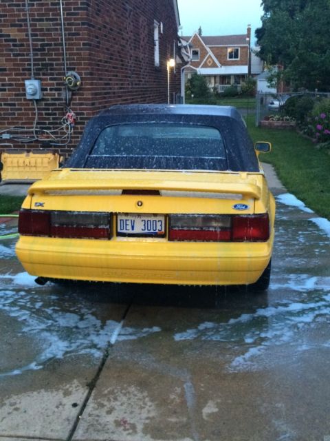 1993 Canary yellow Ford Mustang Convertible