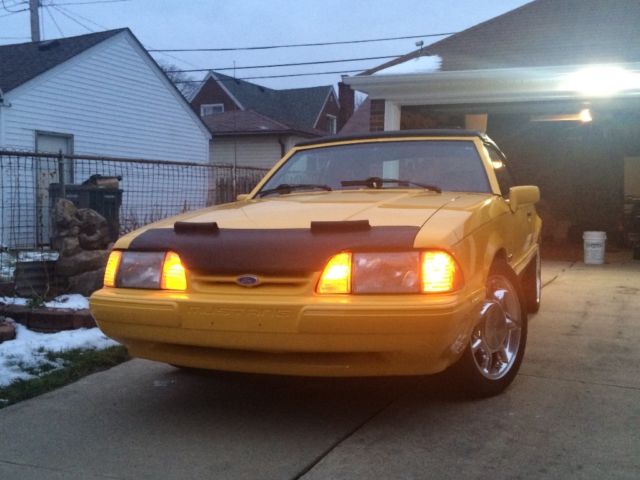 1993 Canary yellow Ford Mustang Convertible