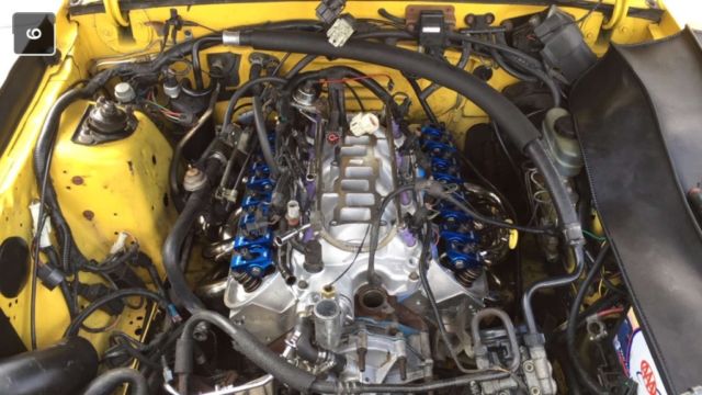 1993 Canary yellow Ford Mustang Convertible