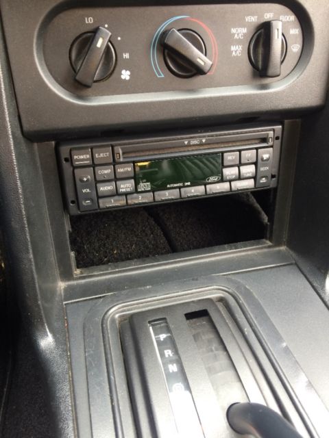 1993 Canary yellow Ford Mustang Convertible