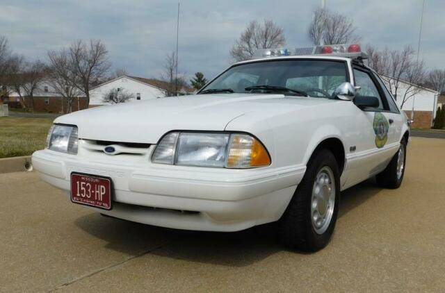 1993 White Ford Mustang --