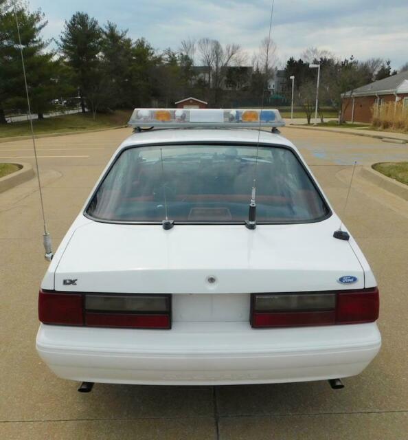 1993 White Ford Mustang --
