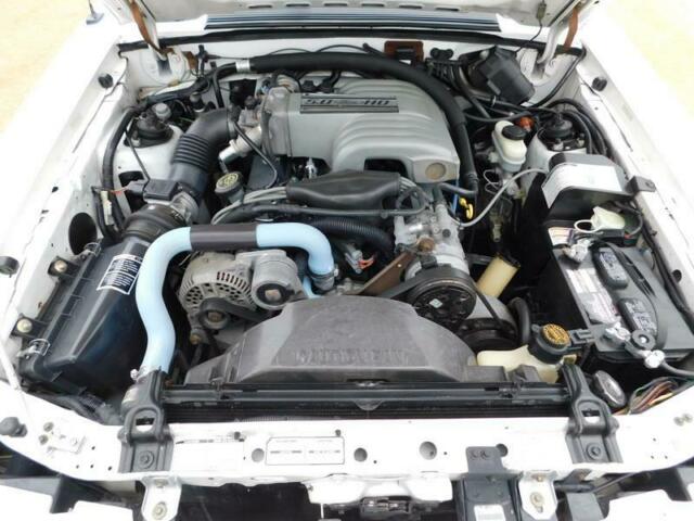 1993 White Ford Mustang --