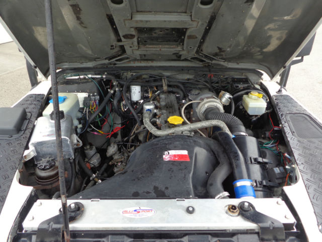 1993 White Land Rover Defender SUV