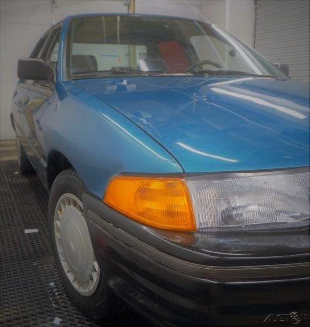 1993 Blue Ford Escort Sedan