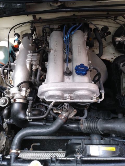 1993 White/Blue Mazda MX-5 Miata Convertible