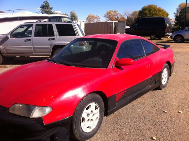 1993 metalic green Mazda MX-6 Coupe