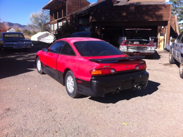 1993 metalic green Mazda MX-6 Coupe