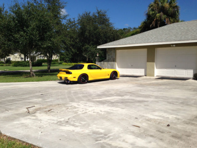 1993 Yellow Mazda RX-7