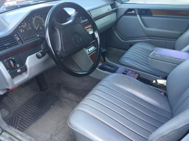 1993 pearl back Mercedes-Benz 300-Series station wagon