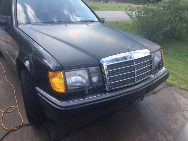 1993 pearl back Mercedes-Benz 300-Series station wagon