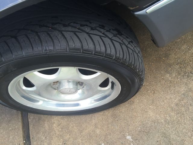 1993 pearl back Mercedes-Benz 300-Series station wagon