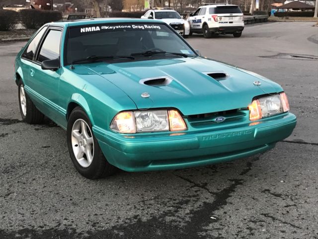 1993 Calypso Coral Ford Mustang Hatchback
