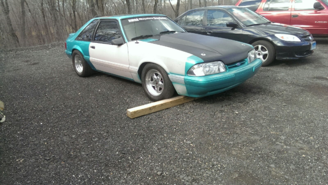 1993 Calypso Coral Ford Mustang Hatchback